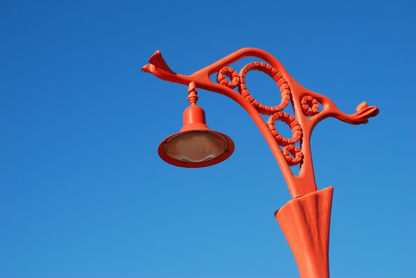 A red lamp post