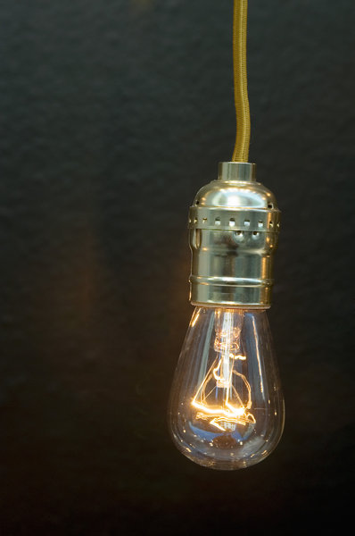 A lightbulb hanging from a cord