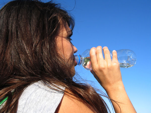 A woman drinking water